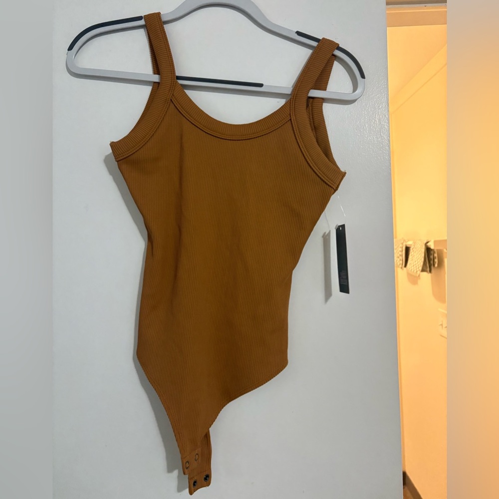 Women’s mustard body suit